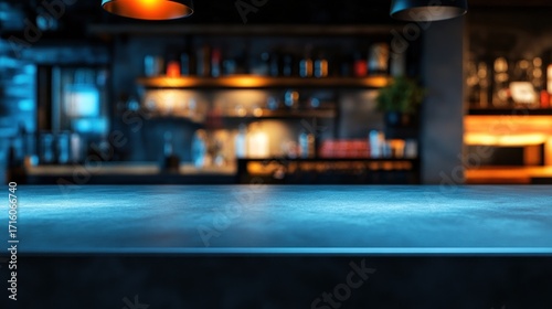 Dark, blurred bar counter with a smooth, blue-toned top
