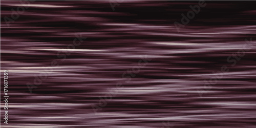 Vibrant purple silk fabric with a gentle wave motion creates a luxurious and colorful backdrop.