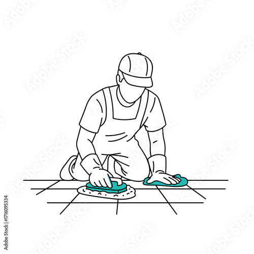 Construction worker kneeling and applying grout to tiles with precision