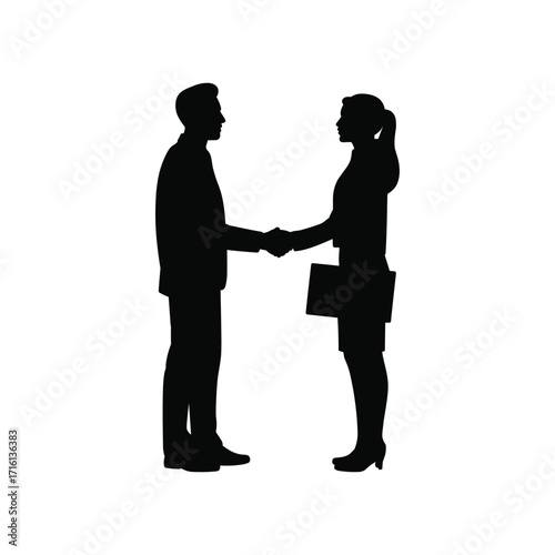 Silhouette of man and woman shaking hands symbolizing business deal partnership agreement success