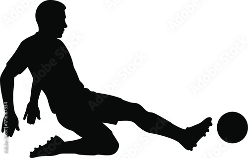 Soccer player sliding tackle extended leg forward, side profile, solid black silhouette