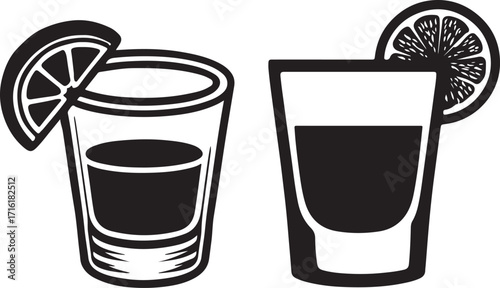 Two shot glasses with lime wedges on the rim.