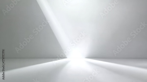 Minimalist white room with bright light source creating sharp shadows and reflections on floor