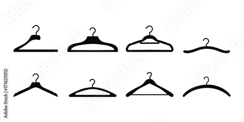 Create a kinds of Different  clothe hangar . Vector art silhouette with white background.  Collection of four clothes hangers in black color . eps 10 