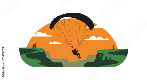 Paraglider silhouette against vibrant sunset landscape with rolling green hills
