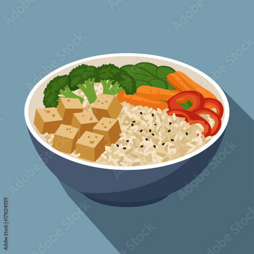 Delicious vegan tofu bowl featuring fresh broccoli, carrots, red peppers and rice