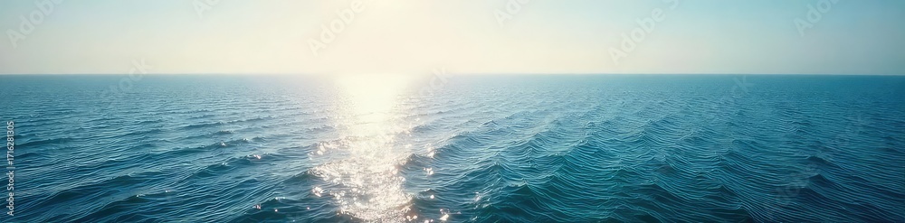 Obraz premium Vast, tranquil ocean stretching to the hazy horizon, sunlight shimmering on the water's surface A serene seascape perfect for travel, nature, or relaxation themes , sunlight, waves