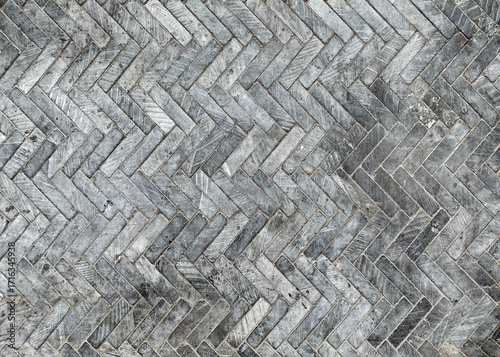 Herringbone pattern of gray stone tiles image photo