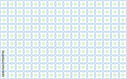 A seamless geometric pattern of interlocking circular shapes in soft blue with a delicate green floral motif at the center of each tile, on a white background, creating a fresh and airy feel.
