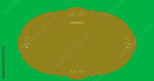 Designer arranging two dough rings on orange badge over clear mosaic background, showcasing bakery