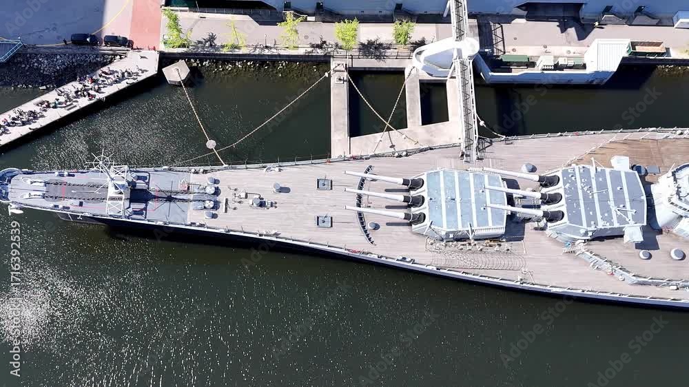 custom made wallpaper toronto digitalA historic Wisconsin BB-64 battleship sits docked at the Norfolk harbor, featuring multiple gun turrets, radar towers, and a towering superstructure, conveying power, defense, and maritime strength