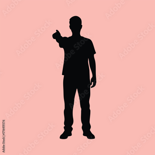 Silhouette of a standing man giving a thumbs up gesture on a solid pastel pink background