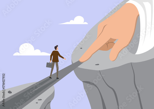 A businessman walks across a narrow bridge connecting two steep cliffs
