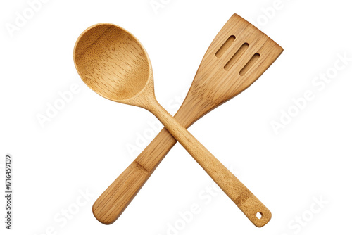 Eco-friendly bamboo kitchen utensils crossed on black background for cooking enthusiasts image