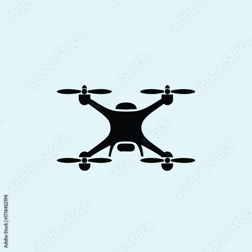 Black silhouette of a quadcopter drone with four propellers on a light blue background isolated