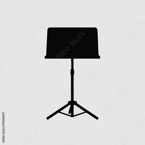 Black silhouette of a music stand with adjustable tripod legs isolated on a plain light gray background