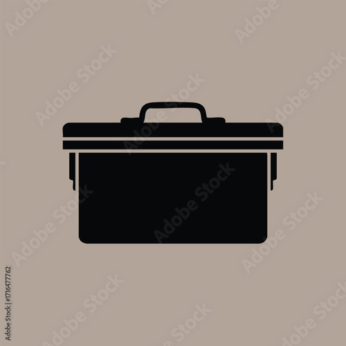 Black silhouette of a closed rectangular toolbox with handle on a solid neutral background in minimal style