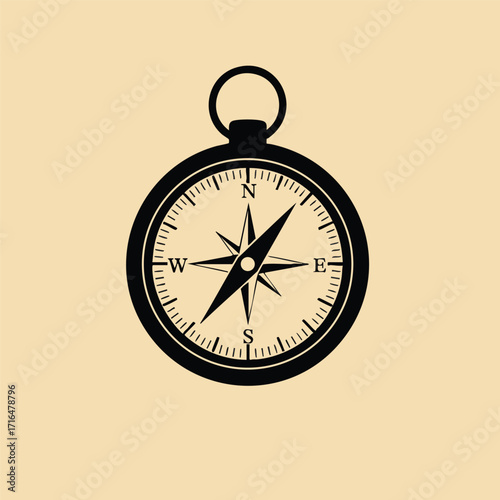 Black silhouette of a classic compass with directional markings on a beige background for navigation concept