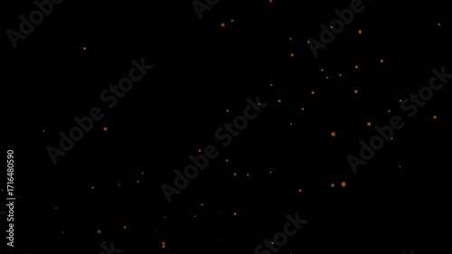 Floating fire flame sparks particles on transparent background video, alpha channel. Realistic fire dust particles moving fast with the wind.Bright glowing fire particles rising fast in a fiery sky wi