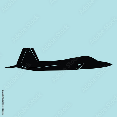 Silhouette of a modern military jet aircraft flying against a clear blue sky background in side view