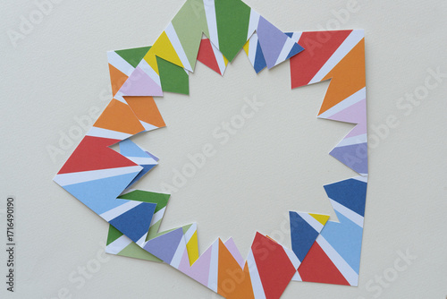  zig-zag frame machine-cut from bold crafting paper with rainbow starbursts