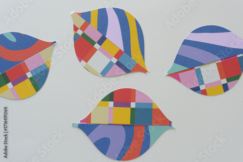 abstract holiday paper ornaments on blank paper