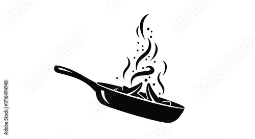 Hot food sizzling in a frying pan with steam rising