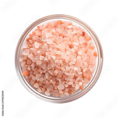 Close up view of Himalayan pink salt in a glass bowl.