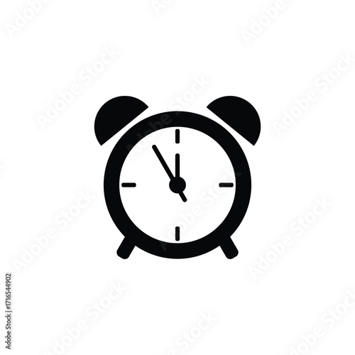 A simple black silhouette of a vintage alarm clock with two bells on top and a white face showing the time.