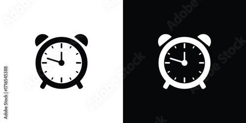 Classic alarm clock icons in black and white