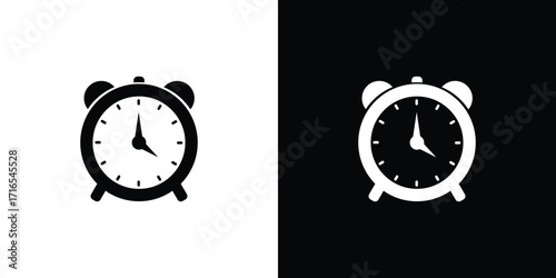 Classic alarm clock icons in black and white contrast