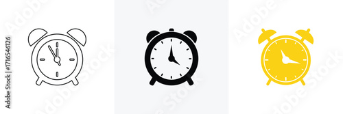 Three alarm clocks showing different times and styles