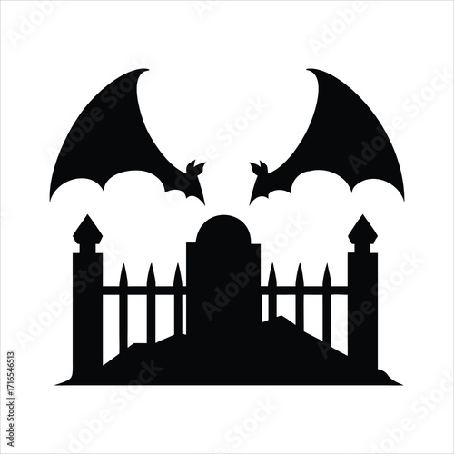 Halloween silhouette of bats flying over a cemetery fence and tombstone