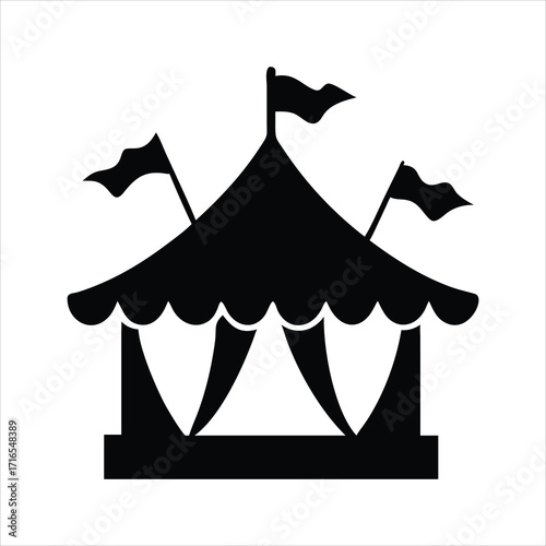 Black silhouette of a circus tent with flags