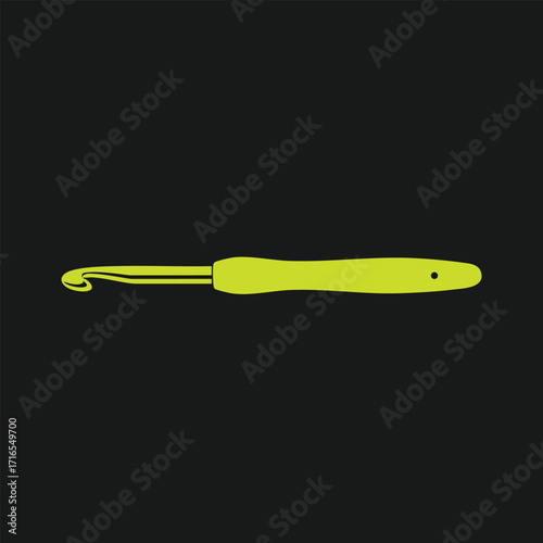 Bright green crochet hook isolated on black background used for knitting and yarn crafting projects with ergonomic handle