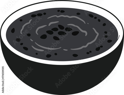 A black bowl filled with a dark, textured food, possibly soup or stew, with visible beans or seeds.