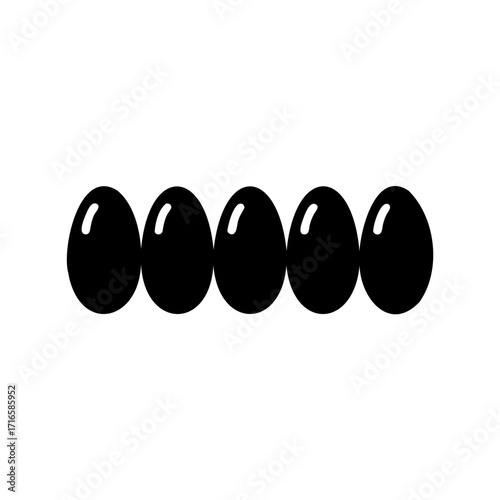 Five black eggs lined up in a row on a white background