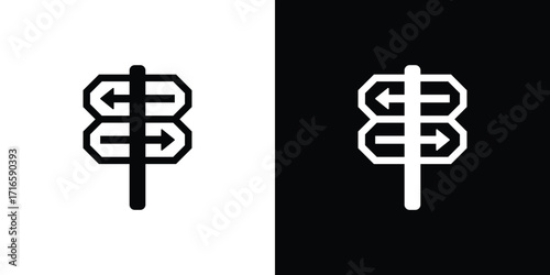 Black and white signpost with arrows showing opposite directions