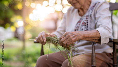 Sweetgrass Breding Elderly Woman Weaving Strs on Rocking Chr at Golden Hour for Digital Detox Cultural Continuity Amidst Honeygold Light Grassgreen Whispers