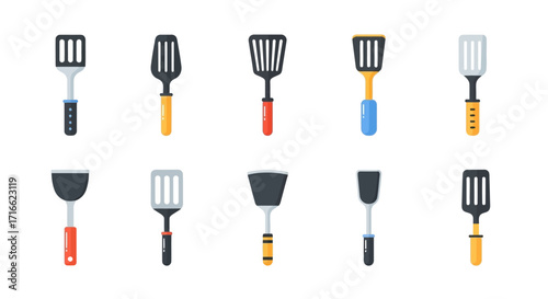 Assortment of Kitchen Spatulas with Colorful Handles and Slotted Heads.
