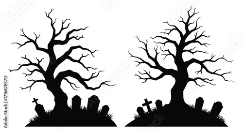 Spooky silhouette of bare trees and a graveyard at nighttime