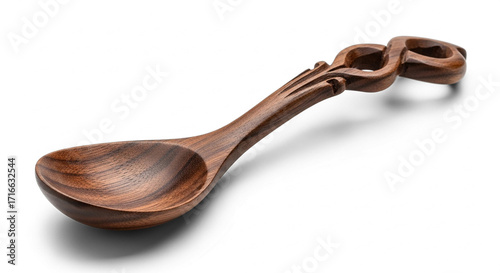 Handcarved dark wooden spoon with an intricate Celtic knot handle.