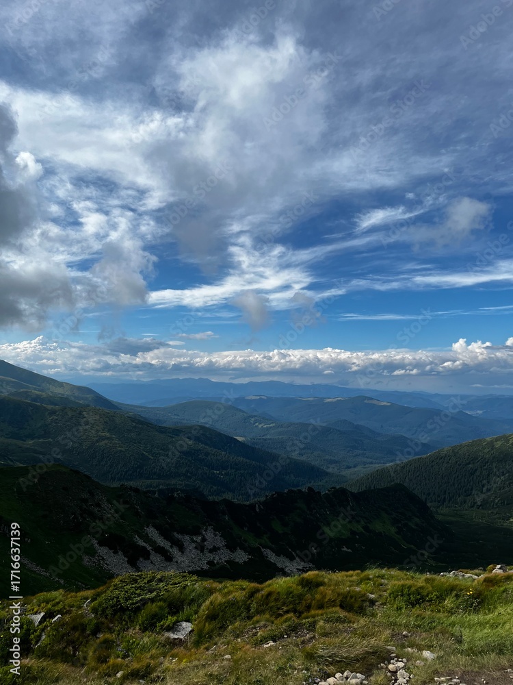 Fototapeta premium clouds over the mountains