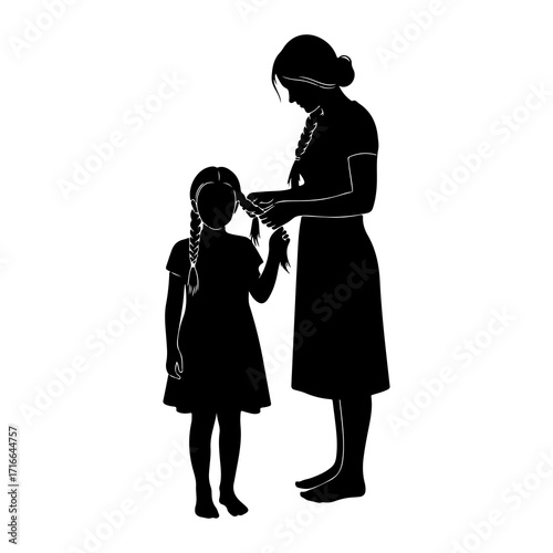Mother braiding daughters hair family