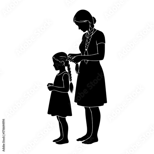 Mother braiding daughters hair pigtails