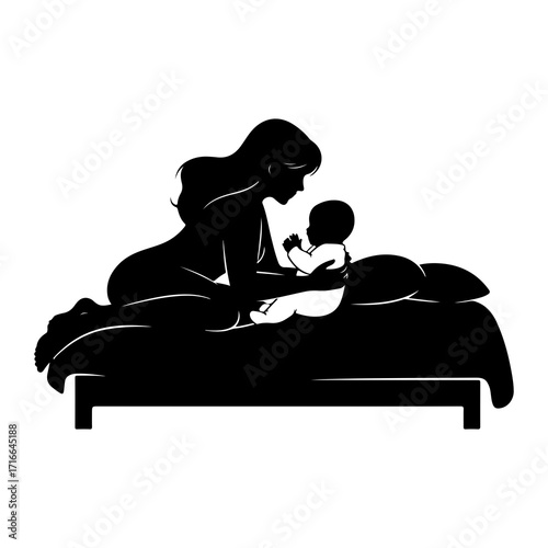 Mother holding baby on bed pillow