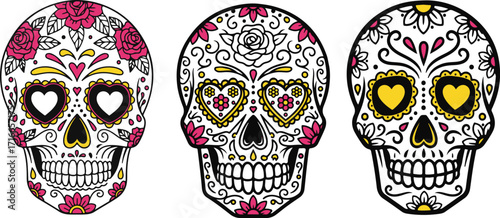 Three colorful sugar skulls decorated with floral patterns and heart shapes