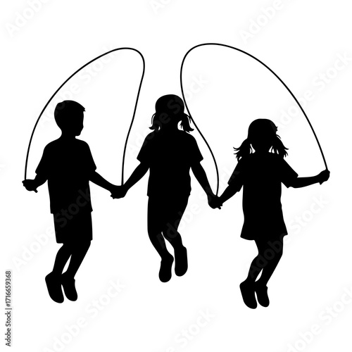 Children jumping rope together playing outdoor activity