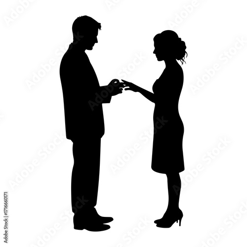 Couple exchanging wedding rings silhouette engagement