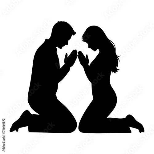 Couple praying together on knees kneeling devotion